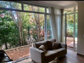 Lovely Escape House in a Frame with Garden